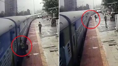 चलती ट्रेन से फिसले युवक को ट्रेन के नीचे आने से RPF कॉन्स्टेबल ने बचाया, देखें वीडियो