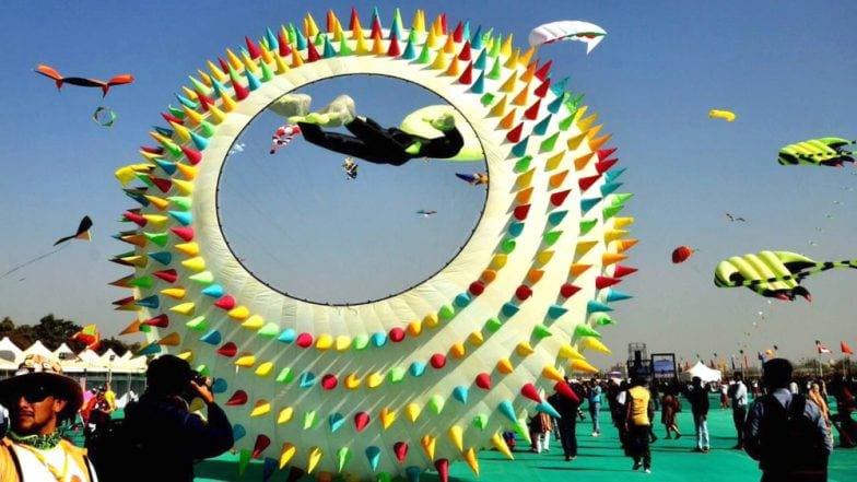 International Kite Festival 2019: अंतरराष्ट्रीय पतंग महोत्सव में दुनिया के 45 देश शामिल, तस्वीरों में देखिए कैसे रंग-बिरंगी पतंगों से गुलजार हुआ आसमान International Kite Festival 2019: अंतरराष्ट्रीय पतंग महोत्सव में दुनिया के 45 देश शामिल, तस्वीरों में देखिए कैसे रंग-बिरंगी पतंगों से गुलजार हुआ आसमान