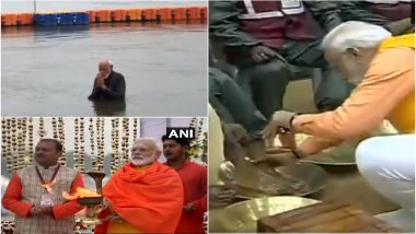 Kumbh Mela 2019: पीएम मोदी ने प्रयागराज कुंभ में लगाई डुबकी, सफाई कर्मियों के धोए पैर, देखें Video