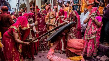 Holi 2019: विश्व प्रसिद्ध है बरसाने की 'लट्ठमार होली', द्वापर युग में जहां श्रीकृष्ण और राधा साथ मिलकर मनाते थे यह पर्व