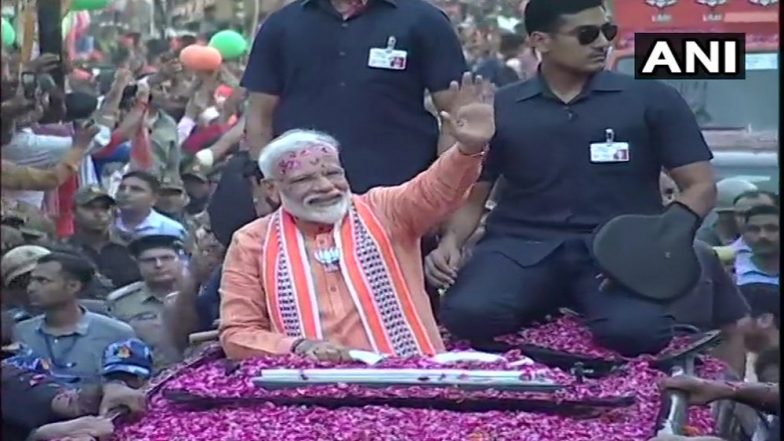 लोकसभा चुनाव 2019: पीएम मोदी के रोड शो में भगवामय हुई काशी, सड़कों पर उमड़ा जनसैलाब