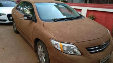 अहमदाबाद: भीषण गर्मी से बचने के लिए शख्स ने निकाला नायाब तरीका, ठंडक पाने के लिए गोबर से लीप दी अपनी कार, देखें वायरल तस्वीरें