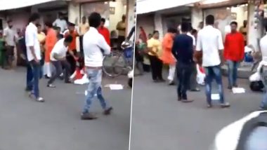 गुजरात में BJP विधायक बलराम थावानी ने सरेआम महिला को लात-घूंसों से पीटा, वीडियो वायरल