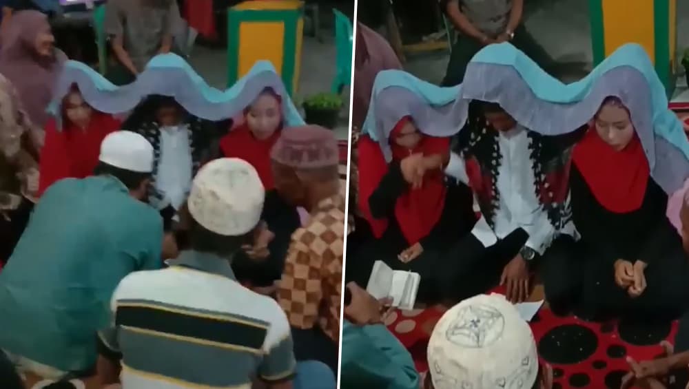 इस शख्स ने अपनी दोनों गर्लफ्रेंड से एक ही मंडप में की शादी, कहा-नाराज नहीं कर सकता, देखें वीडियो इस शख्स ने अपनी दोनों गर्लफ्रेंड से एक ही मंडप में की शादी, कहा-नाराज नहीं कर सकता, देखें वीडियो