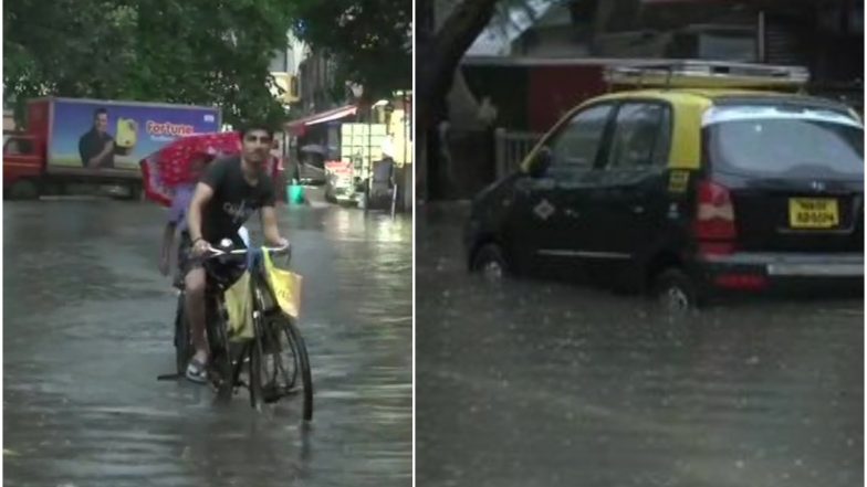 Mumbai Rains: रविवार को भी जारी है भारी बारिश, सड़कों पर जमा पानी, रेल-बस सेवा प्रभावित