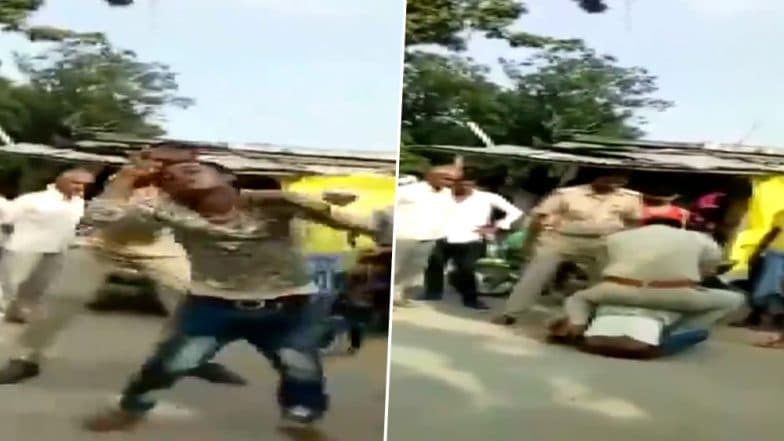 Video: बाइक सवार ने किया ट्रैफिक नियमों का उल्लंघन, दो पुलिसकर्मियों ने लात-घूंसों से की पिटाई, यूपी पुलिस ने की ये कार्रवाई