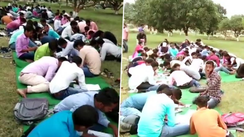 बिहार: नीतीश सरकार की शिक्षा व्यवस्था की खुली पोल, बेतिया में खुले में परीक्षा देते नजर आए स्टूडेंट्स