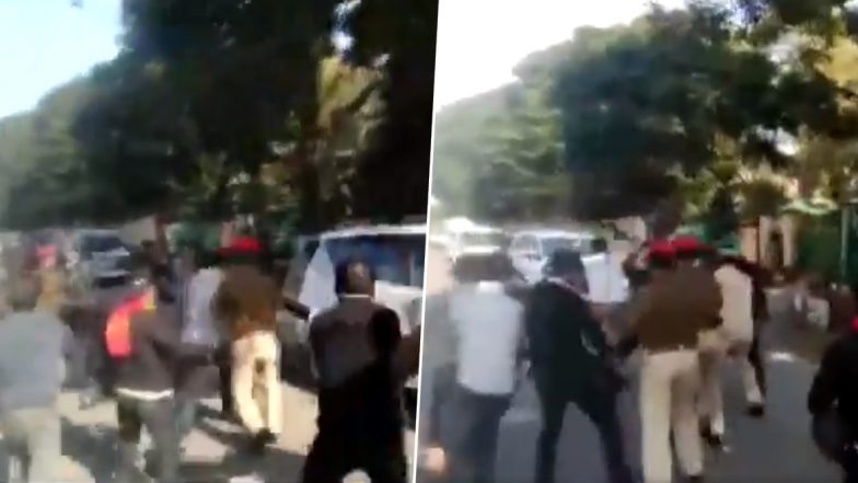 असम के सीएम सर्बानंद सोनोवाल के काफिले को AASU के सदस्यों ने दिखाए काले झंडे, वायरल हुआ Video