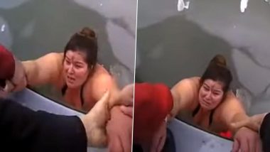 मिशिगन की एक महिला फिशिंग के दौरान जमे हुए पानी में गिरी, रेस्क्यू वीडियो वायरल होने के बाद इंटरनेट पर लोगों ने की बॉडी शेमिंग