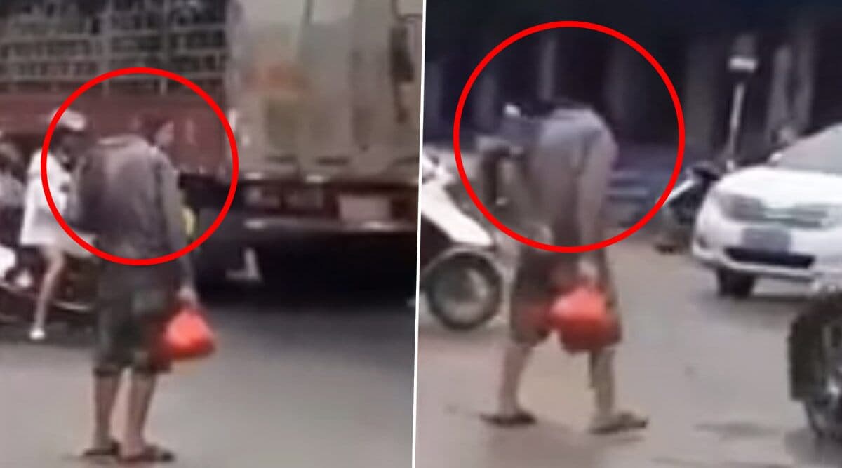सड़क पर चलता दिखा बिना सिर का इंसान, Video हो रहा है वायरल सड़क पर चलता दिखा बिना सिर का इंसान, Video हो रहा है वायरल