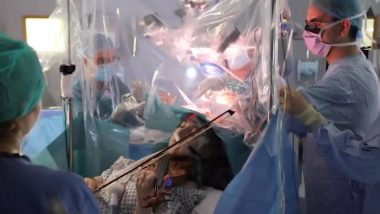ब्रेन ट्यूमर की सर्जरी के दौरान वायलिन बजाती दिखी पीड़ित महिला, वीडियो हुआ वायरल