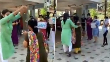 कोरोना मरीजों का इलाज कर 20 दिन बाद घर लौटीं डॉक्टर, लोगों ने फूल बरसाकर तालियों के साथ किया स्वागत- देखें Video