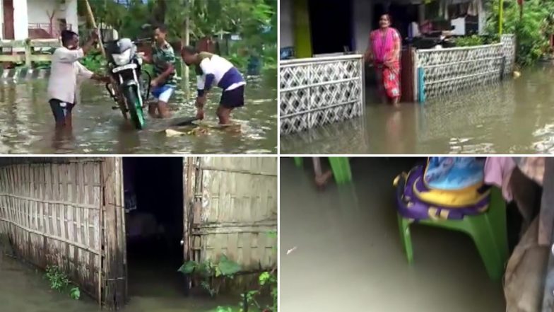 असम: भारी बारिश से लोगों का हाल बेहाल, आवासीय क्षेत्रों में घुसा बाढ़ का पानी, देखें तस्वीर