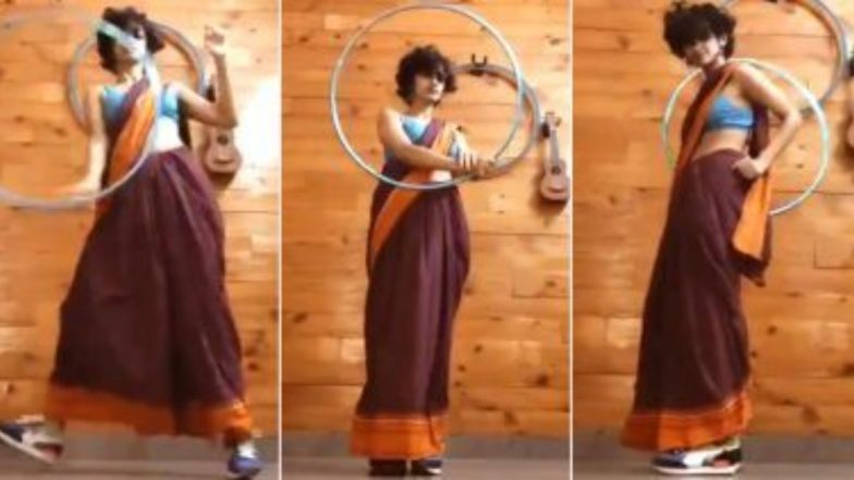 Hula Hoop Saree Dance: सारी और स्नीकर्स पहनक कर ससुराल गेंदा फूल पर एशना कुट्टी ने किया हूला हूप डांस, सोशल मीडिया पर वायरल हुआ वीडियो (Watch Viral Video)