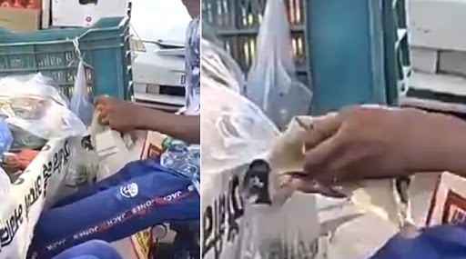 Face Mask Misuse: कोरोना वायरस के बढ़ते मामलों के बीच फेस मास्क से फल साफ़ कर रहा था शख्स, सोशल मीडिया पर वायरल हुआ वीडियो