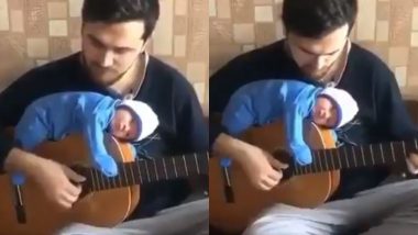 Adorable Viral Video: अपने नवजात बच्चे के साथ गिटार बजाते पिता का प्यारा वीडियो हुआ वायरल, देखकर आप भी कहेंगे So Cute