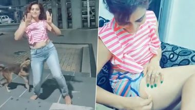 वीडियो बनाने के लिए रास्ते पर डांस कर रही थी लड़की, बीच में आकर कुत्ते ने काटा तो हुआ ऐसा हाल (Watch Viral Video)