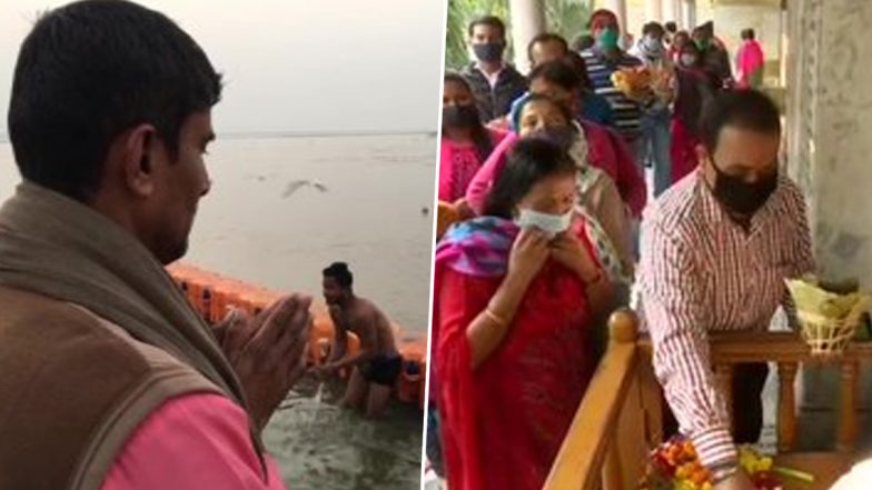 New Year 2021: नए साल पर आस्था के कई रंग, किसी ने लगाई गंगा में डुबकी तो कई पहुंचे भगवान के द्वार- देखें Photos