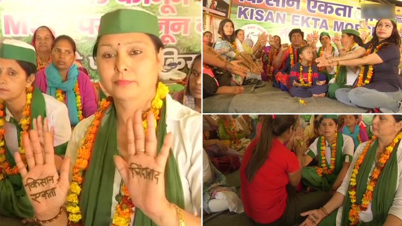 Farmers Protest: गाजीपुर बॉर्डर पर बड़ी संख्या में पहुंची महिलाओं ने एक दूसरे को मेहंदी लगाकर दिखाई एकजुटता, इसे दिया है 'इंकलाबी मेहंदी' का नाम