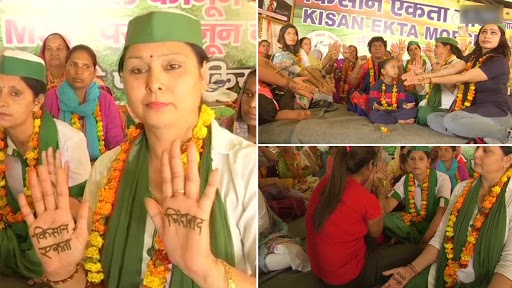 Farmers Protests: गाज़ीपुर बॉर्डर पर विरोध में प्रदर्शन में शामिल होने पहुंची महिलाएं, एक दूसरे को मेहंदी लगाकर दिखाई अपनी एकजुटता
