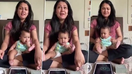 इस छोटे से बच्चे को अपनी मां की गोद में बैठकर गाना गाते देख बन जाएगा दिन, देखें वीडियो