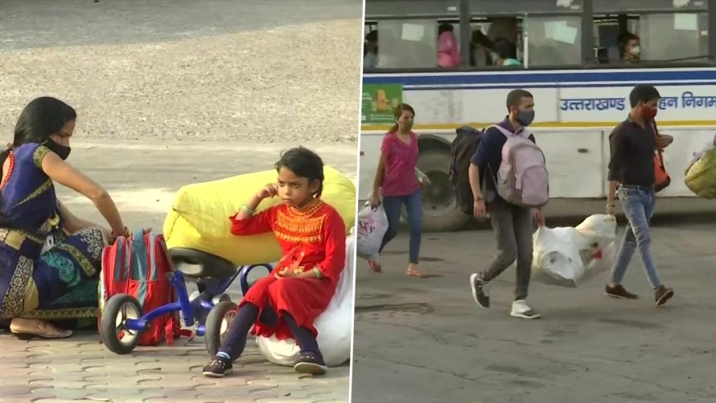 दिल्ली में कोरोना के बढ़ते मामलों के कारण अपने घर लौट रहे प्रवासी श्रमिक