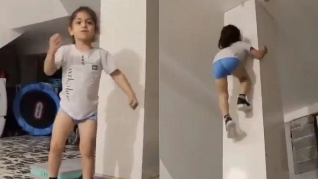 OMG! खंभे पर स्पाइडर मैन की तरह चढ़ती है यह छोटी बच्ची, कारनामे देखकर छूट जाएंगे आपके पसीने 