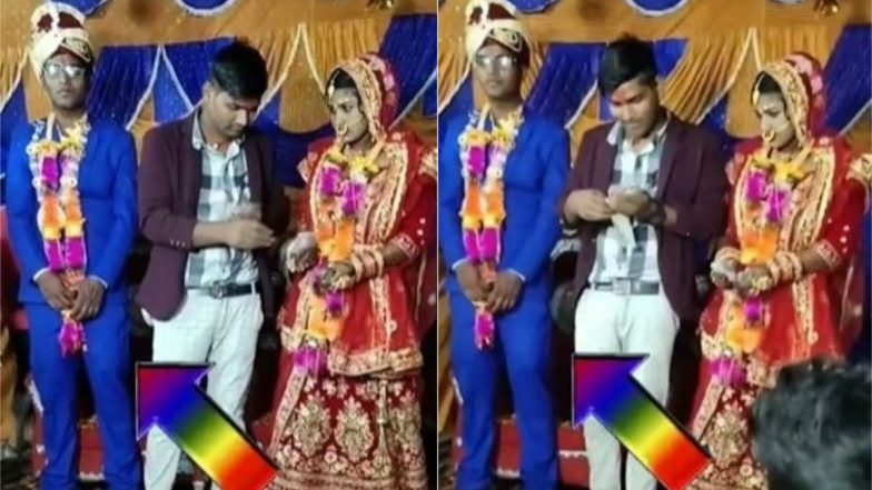 Viral Video: स्टेज पर आकर दुल्हन के साथ मस्ती-मजाक करने लगा शख्स, वायरल वीडियो में देखें कैसे गुस्से से आग-बबूला हुआ दूल्हा