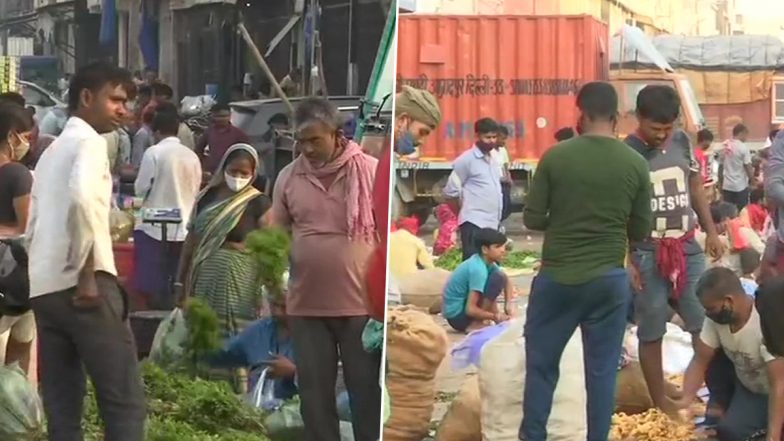 Delhi: आज़ादपुर सब्ज़ी मंडी में लोगों की भारी भीड़, कोरोना नियमों की उड़ाई धज्जियां