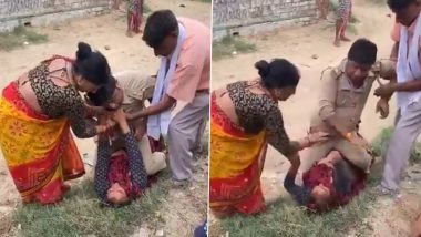 Uttar Pradesh: पुलिस अधिकारी पर महिला के ऊपर बैठकर मारपीट करने का आरोप