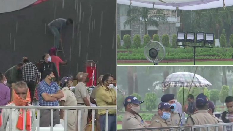 Uttarakhand: बारिश के बीच देहरादून के राजभवन में पुष्कर सिंह धामी के शपथ ग्रहण समारोह की चल रही है तैयारियां