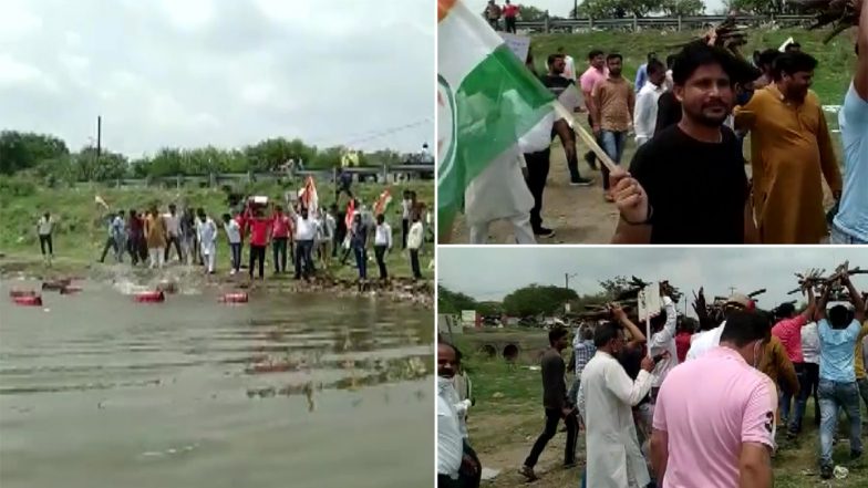 मध्य प्रदेश: कांग्रेस का LPG के दामों में बढ़ोतरी को लेकर मोदी सरकार के खिलाफ प्रदर्शन, तालाब में सिलेंडर फेंक जताया विरोध- देखें वीडियो