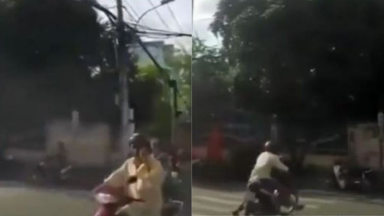 सावधानी हटी, दुर्घटना घटी! फोन पर बात करते हुए स्कूटी चला रहे शख्स के साथ हुआ कुछ ऐसा… (Watch Viral Video)