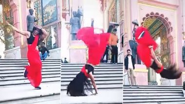 Backflip in Saree: लाल साड़ी में लड़की ने किया जबरदस्त बैकफ्लिप, नेटीजन्स हुए हैरान, देखें वीडियो