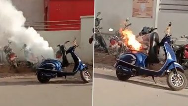 E Scooter Blast Video: अचानक से धूं धूं कर जलने लगी सड़क पर खड़ी स्कूटर, हैरान कर देने वाला वीडियो हुआ वायरल