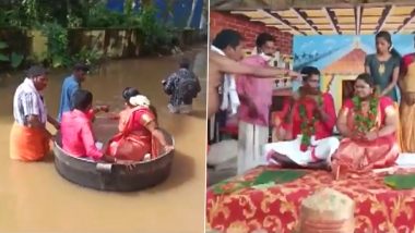 केरल में बाढ़ के बीच अनोखी शादी, दूल्हा-दुल्हन को खाना बनाने वाले बर्तन में बैठाकर मंदिर पहुंचाया गया- देखें वीडियो