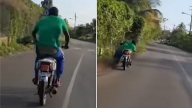 बाइक चलाते समय शख्स करने लगा स्टंट, फिर हुआ कुछ ऐसा… Viral Video देख हैरान हो जाएंगे आप