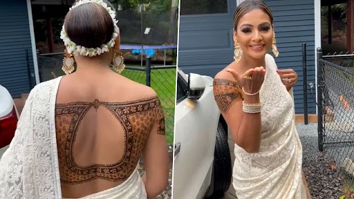 Henna Blouse Video: साड़ी के साथ मेंहदी ब्लाउज पहने महिला का वीडियो वायरल, यूनिक स्टाइल देख लोग हैरान