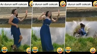 Viral Video: कीचड़ से भरे तालाब के किनारे लड़की ले रही थी सेल्फी, पैर फिसलते ही गिरी धड़ाम से, देखें मजेदार वीडियो