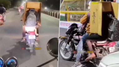 बाइक के पीछे बैठे लड़के ने ठंड से बचने के लिए लगाया गजब का दिमाग, देसी जुगाड़ को देख चकराया लोगों का दिमाग (Watch Viral Video)