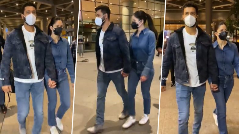 PHOTOS: Katrina Kaif का हाथ थामे एयरपोर्ट पर दिखे Vicky Kaushal, मुंबई में Valentine's Day मनाएगा कपल