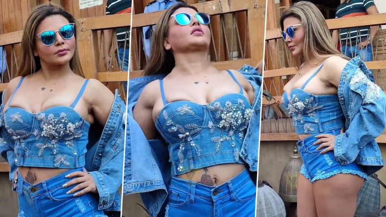 Rakhi Sawant Removes Jacket: फोटोग्राफर्स को पोज देने के लिए राखी सावंत ने उतारा जैकेट, जीन्स की शॉर्ट्स में लगी कयामत