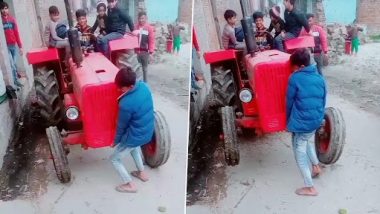 Viral Video: छोटे से लड़के ने उठा दिया ट्रैक्टर, बच्चे की ताकत देख लोग रह गए दंग