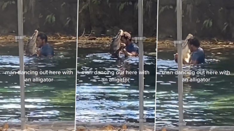 Dance With Crocodile: शख्स ने पानी में किया मगरमच्छ के साथ रोमांटिक डांस, Viral Video देख उड़ जाएंगे आपके होश