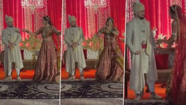 Viral Video: 'आईला रे आईला' गाने पर अपनी दुल्हन को डांस करते देख शरमाया दूल्हा, क्यूट वीडियो वायरल