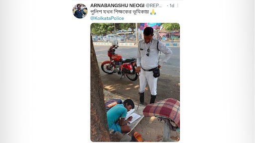 कोलकाता के गार्ड ने ट्रैफिक मैनेज करने के साथ 8 साल के लड़के को पढ़ाते हुए तस्वीर वायरल, फोटो ने जीता लोगों का दिल