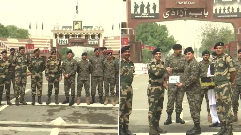 Eid-Ul-Fitr 2022: अटारी-वाघा सीमा पर BSF और पाकिस्तानी रेंजर्स ने किया मिठाइयों का आदान-प्रदान, देखें तस्वीरें