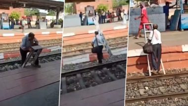 Viral Video: रेलवे ट्रैक को पार कर दूसरे प्लेटफॉर्म पर जाने के लिए शख्स ने किया सीढ़ी का इस्तेमाल, वीडियो हुआ वायरल