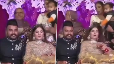 शादी में फोटो सेशन के दौरान बच्चे ने जोर से खींच लिए दुल्हन के बाल, हो गया ऐसा हाल (Watch Viral Video)