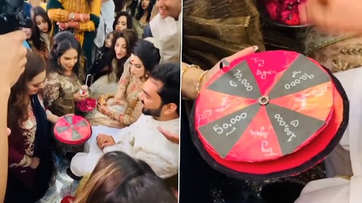 Viral Video: जूता-चुराई के दौरान पैसे मांगने के लिए सालियों ने खेला 'स्पिन द व्हील गेम', देखें वीडियो